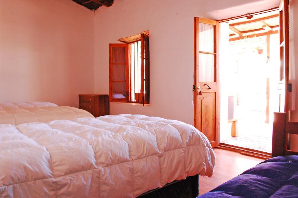 La Casa Del Pueblo Hostal Сан-Педро-де-Атакама Номер фото